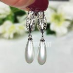 срібні сережки з перлиною